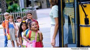 children-boarding-school-bus