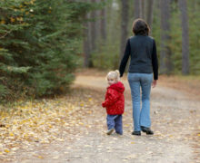 woman-walking-with-child
